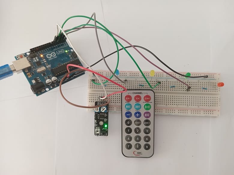 Mounting the Arduino UNO board with the KY-032 infrared sensor and four LEDs
