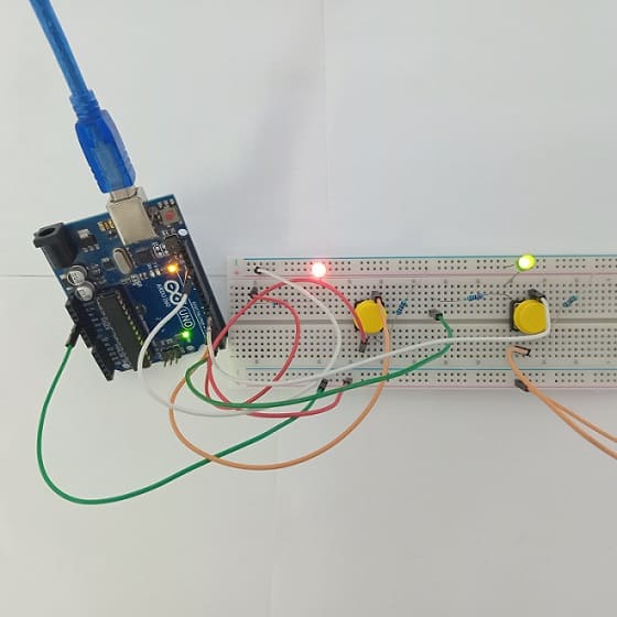 Montage de la carte Arduino UNO avec deux LEDs et deux boutons poussoirs