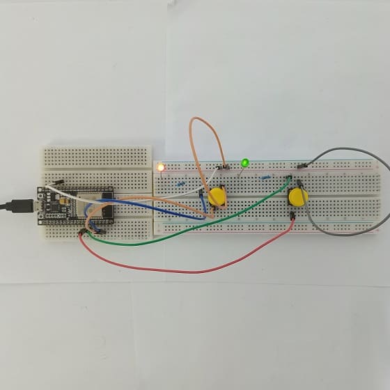 Mounting the ESP32 board with two LEDs and push buttons