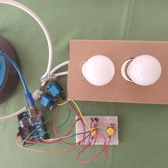 Mounting the Arduino UNO board with two lamps, two relays and push buttons
