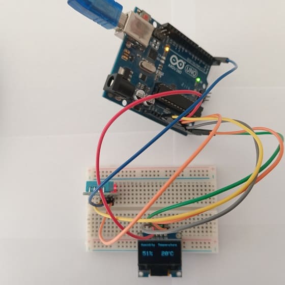 Mounting the Arduino board with the DHT11 sensor and the SSD1306 display