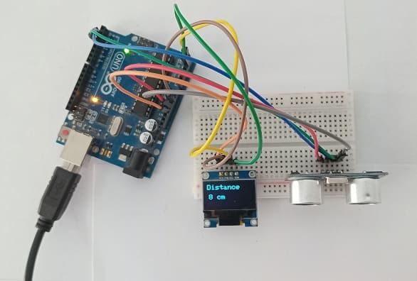 Mounting Arduino UNO with the HC-SR04 ultrasonic sensor and SSD1306 screen